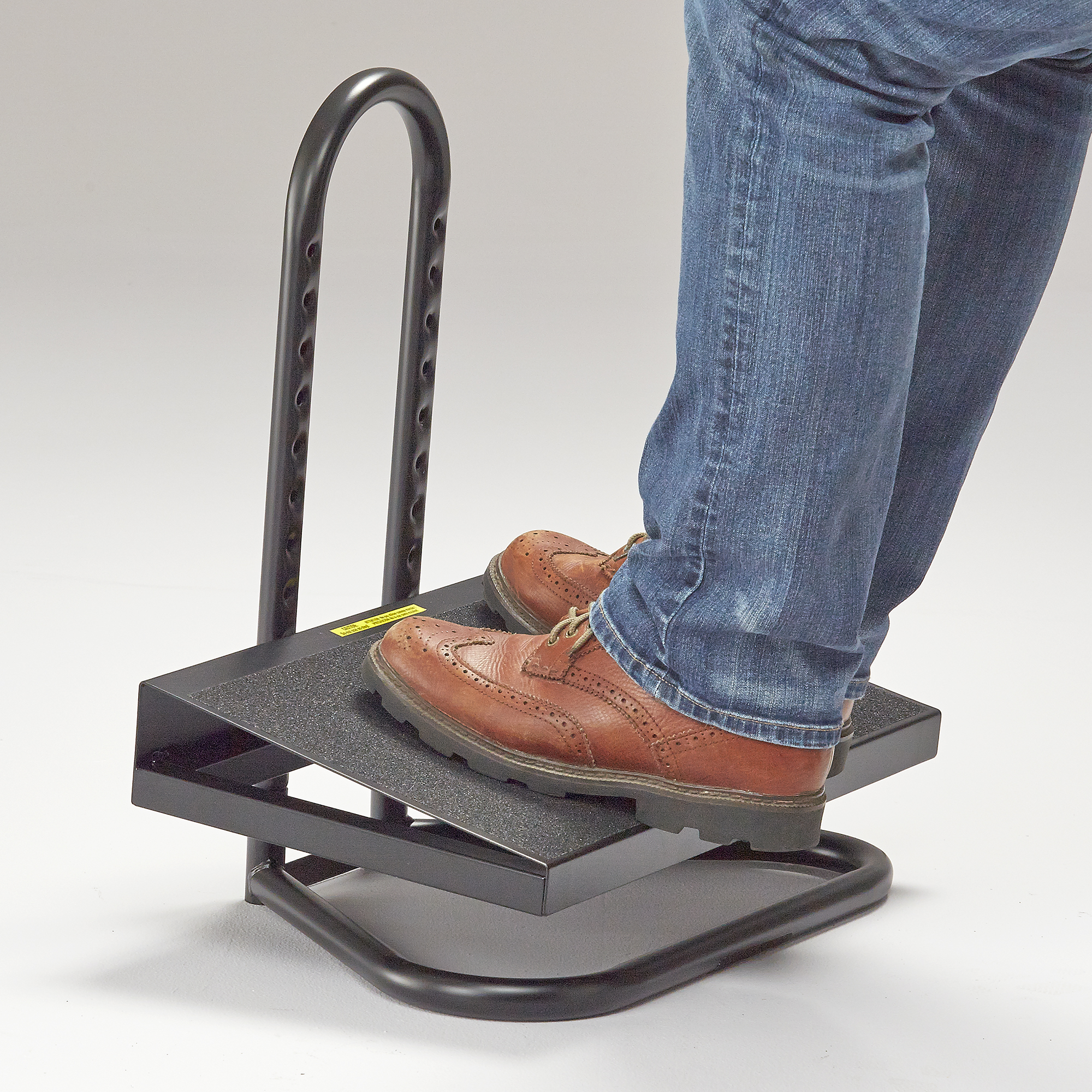 Get relief for your feet with this adjustable footrest. –